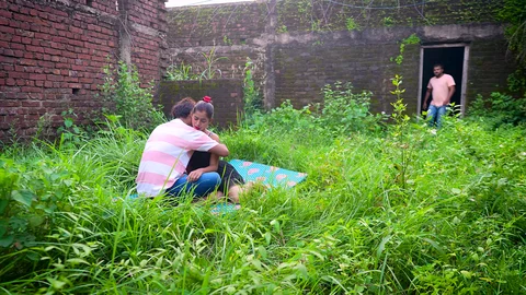 When a couple was getting ready to have sex in the ruins, a guy caught them and then had rough sex with the girl.